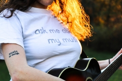 "Ask me about my music" shirt / "Music is enough" tattoo